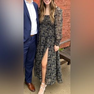 Black sheer pattern dress with slit